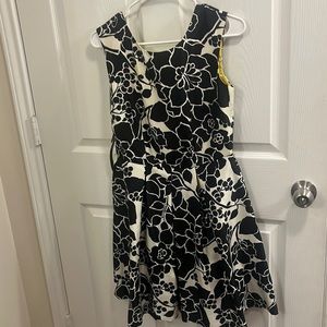The limited floral black & white dress with yellow belt